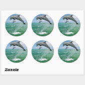 Dolfine in het wild springen en spelen ronde sticker (Vel)