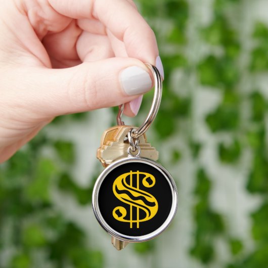 Dollar — Amber Sleutelhanger (Hand)