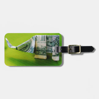 Dollar bill origami Elephant on Green background Bagagelabel