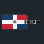 Dominicaanse vlag bagagelabel<br><div class="desc">De vlag van de Dominicaanse Republiek is een wit kruis met het nationale wapenschild in het midden. De gebruikte kleuren in de vlag zijn blauw, rood, wit. Het aandeel onder de vlag van de Dominicaanse Republiek bedraagt 2:3. De vlag van de Dominicaanse Republiek werd in 1908 aangenomen. Het eerste gebruik...</div>