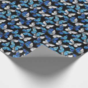 Donker naadloos patroon met blauwe vlinders Morpho Cadeaupapier