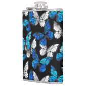 Donker naadloos patroon met blauwe vlinders Morpho Heupfles (Links)