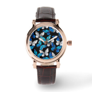 Donker naadloos patroon met blauwe vlinders Morpho Horloge