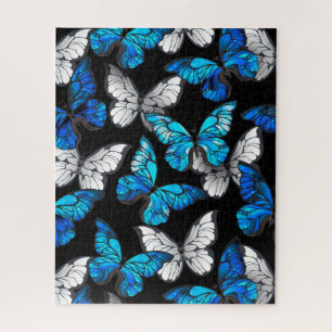 Donker naadloos patroon met blauwe vlinders Morpho Legpuzzel