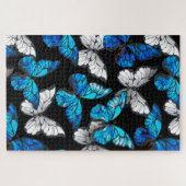 Donker naadloos patroon met blauwe vlinders Morpho Legpuzzel (Horizontaal)