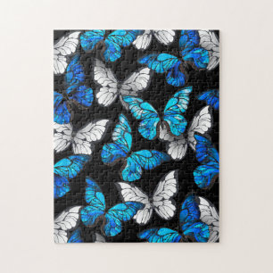 Donker naadloos patroon met blauwe vlinders Morpho Legpuzzel