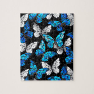 Donker naadloos patroon met blauwe vlinders Morpho Legpuzzel