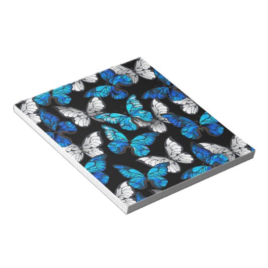 Donker naadloos patroon met blauwe vlinders Morpho Notitieblok (Schuin)