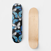 Donker naadloos patroon met blauwe vlinders Morpho Persoonlijk Skateboard (Voorkant)
