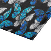 Donker naadloos patroon met blauwe vlinders Morpho Snijplank (Hoek)