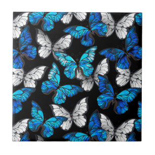 Donker naadloos patroon met blauwe vlinders Morpho Tegeltje
