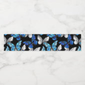 Donker naadloos patroon met blauwe vlinders Morpho Waterfles Etiket (Enkel label)
