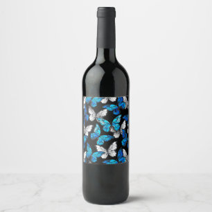 Donker naadloos patroon met blauwe vlinders Morpho Wijn Etiket