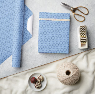 Donkerblauwe golvende gestippelde lijnen op pastel cadeaupapier