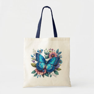 Donkerblauwe vlinder die bovenop bloemontwerp ligt tote bag