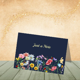 Donkerblauwe wilde bloemen in het veld Notitiekaar Bedankkaart