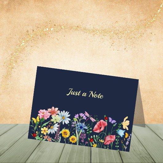 Donkerblauwe wilde bloemen in het veld Notitiekaar Bedankkaart