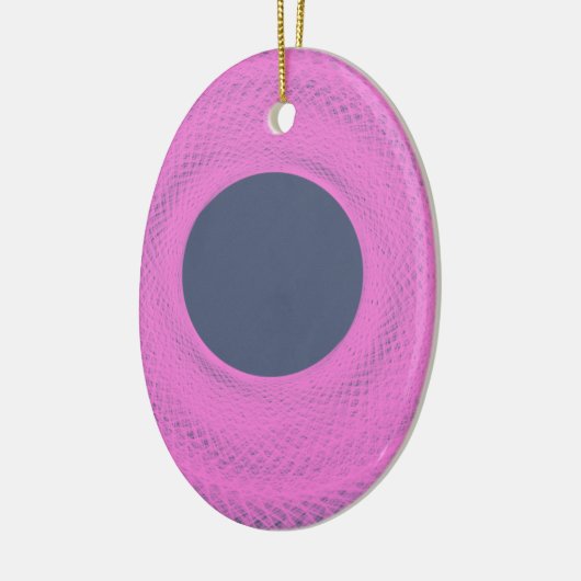 donkere cirkel in het paars keramisch ornament (Links)