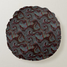 Donkere gekleurde geslepen spiraaldelen en gloeist rond kussen