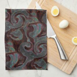 Donkere gekleurde geslepen spiraaldelen en gloeist theedoek