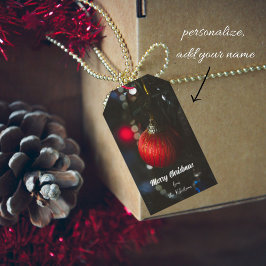 Donkere glamour rode kerst bables en slinger cadeaulabel