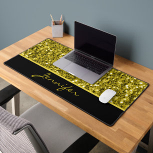 Donkere gouden glittersparkelingen en zwarte aange bureaumat