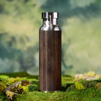 Donkere houten planken met houten korrel waterfles