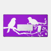 Donkere landvogels op rust bureaumat (Keyboard & Muis)