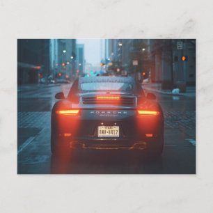 Donkere sportauto briefkaart