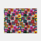 Donkere vierkantjes op licht deurmat (Voorkant)