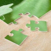 Donkere vlinder die op leder zit legpuzzel (Zijkant)