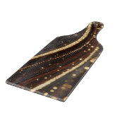 Donkere walnoot houtnerf met sprankelende gouden r snijplank (Hoek)