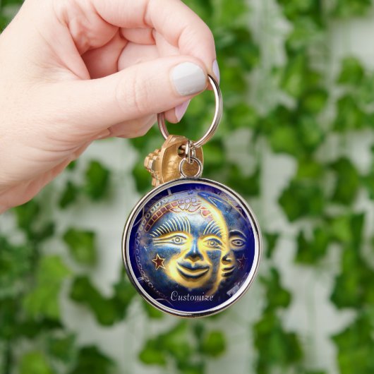 donkere zon/maanzijde sleutelhanger (Hand)