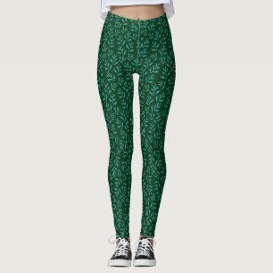 Donkergroene achtergrond met turquoise botanische leggings