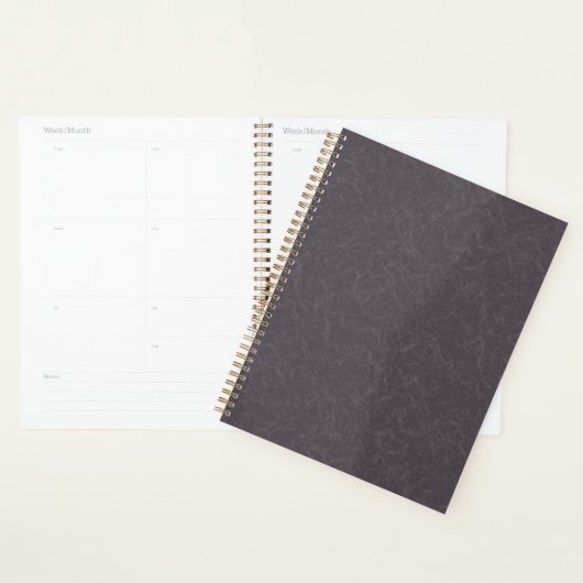 Donkerpaarse gestructureerde oppervlak wervelend p planner (Display)