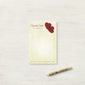 Donkerrode harten post-it® notes (Op bureau)