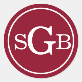 Donkerrood cirkelvormig traditioneel monogram ronde sticker