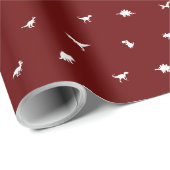 Donkerrood met witte dinosaurus silhouetten cadeaupapier (Rol Hoek)