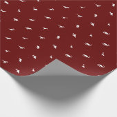 Donkerrood met witte dinosaurus silhouetten cadeaupapier (Hoek)