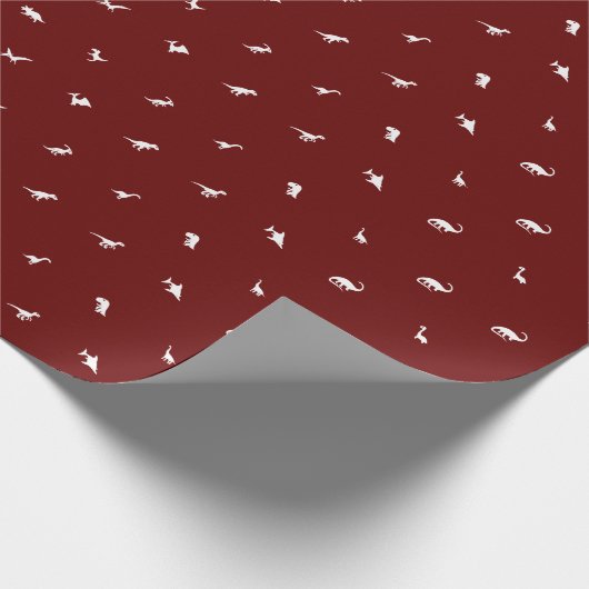 Donkerrood met witte dinosaurus silhouetten cadeaupapier (Hoek)