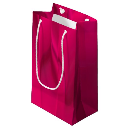 Donkerroze uitgesmeerde kleur klein cadeauzakje (Voorkant Gekanteld)