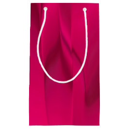 Donkerroze uitgesmeerde kleur klein cadeauzakje