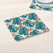 Donkerturquoise monstera, fijne perzik en geel kartonnen onderzetters (Schuin)