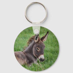 Donkey in de gras sleutelhanger