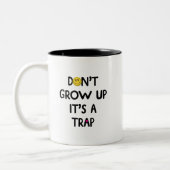 Don't grow up, it's a trap! Mug Tweekleurige Koffiemok (Links)