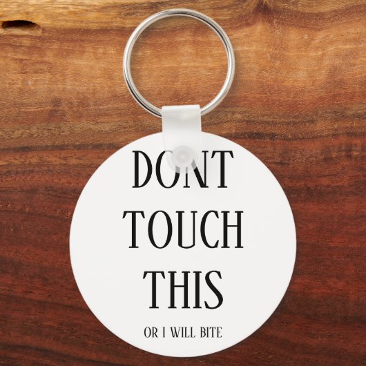"Dont touch this or i will bite" sleutelhanger (Voorkant)