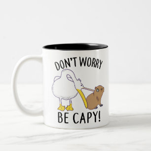 Don't Worry, Be Capy. Capybara Orange Unbothered Tweekleurige Koffiemok