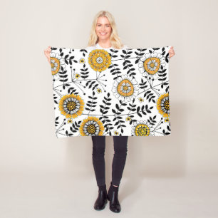 Doodle bloemen en bladeren in geel en zwart fleece deken