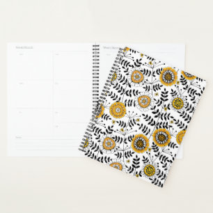 Doodle bloemen en bladeren in geel en zwart planner