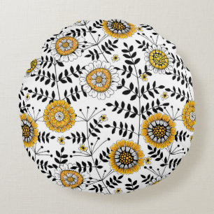 Doodle bloemen en bladeren in geel en zwart rond kussen